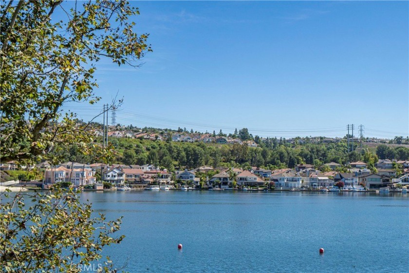 THIS LAKEFRONT BEAUTY IS CERTAINLY ONE OF THE MOST PRIVATE - Beach Condo for sale in Mission Viejo, California on Beachhouse.com