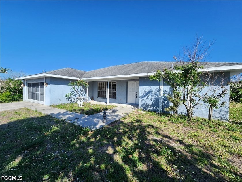 Welcome to this spacious 3-bedroom, 2-bath home located in the - Beach Home for sale in Lehigh Acres, Florida on Beachhouse.com