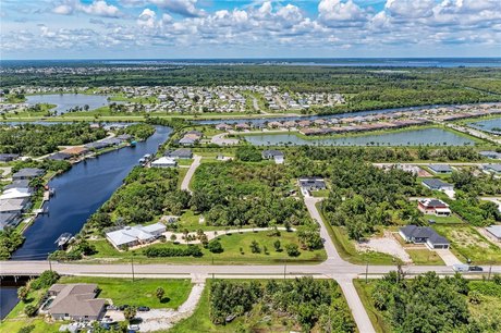 GULF ACCESS. End of the Canal lot! NO BRIDGES. Lot next door - Beach Lot for sale in Port Charlotte, Florida on Beachhouse.com