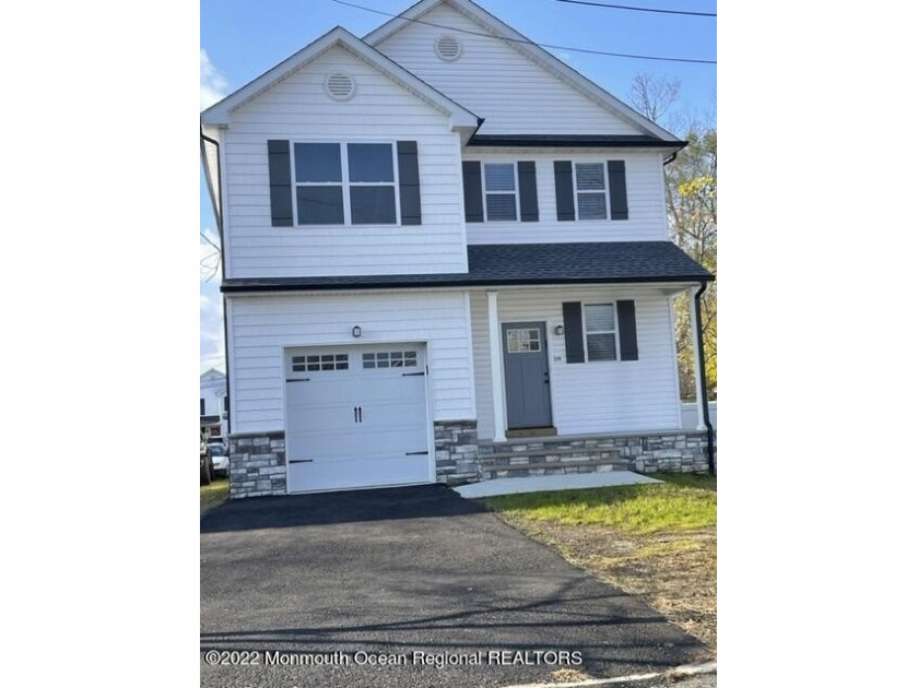 Stunning New Construction with Partial Bay View!Sitting on a - Beach Home for sale in Cliffwood, New Jersey on Beachhouse.com