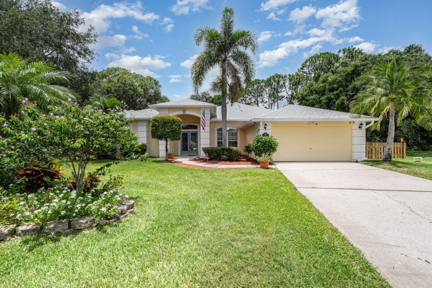 This lovely 3/2 pool home is situated on .53 of an acre - Beach Home for sale in West Melbourne, Florida on Beachhouse.com