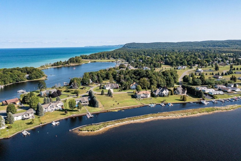 Experience 100 feet of breathtaking lake frontage on pristine - Beach Lot for sale in Arcadia, Michigan on Beachhouse.com