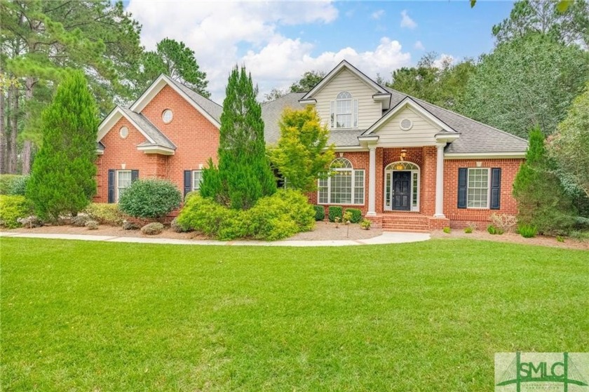 Nestled on a private, half-acre lot, this stately 5BD/4BA brick - Beach Home for sale in Savannah, Georgia on Beachhouse.com