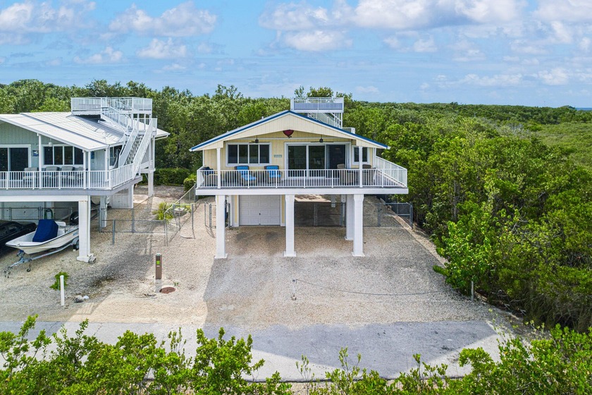 Discover exceptional Florida Keys living in this elevated - Beach Home for sale in Key Largo, Florida on Beachhouse.com