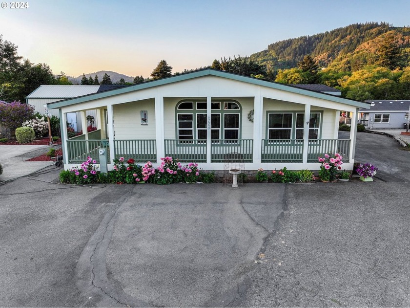 Embrace coastal living in this spacious 3-bedroom, 2-bathroom - Beach Home for sale in Brookings, Oregon on Beachhouse.com