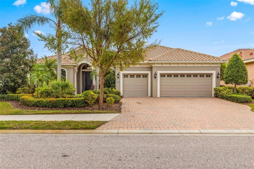 Welcome to this stunning 4-Bedroom Home with Lake  Golf Views! - Beach Home for sale in Lakewood Ranch, Florida on Beachhouse.com