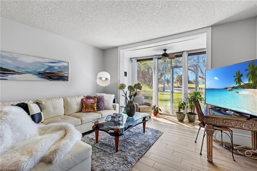 Upgraded, airy, and chic first-floor condo with tranquil lake - Beach Condo for sale in Naples, Florida on Beachhouse.com