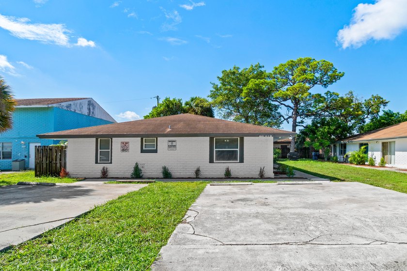 Brand new roof going up.. Beautifully updated and maintained - Beach Home for sale in Riviera Beach, Florida on Beachhouse.com