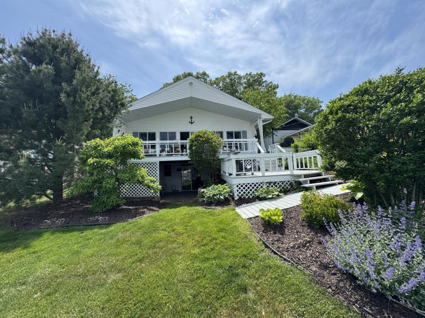 TURN KEY! SPRING LAKE WATERFRONT HOME With a fabulous 6ft wide - Beach Home for sale in Spring Lake, Michigan on Beachhouse.com