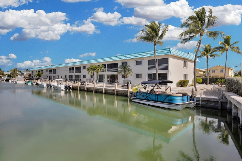 Welcome to Coral Club in the desirable waterfront neighborhood - Beach Condo for sale in Marathon, Florida on Beachhouse.com