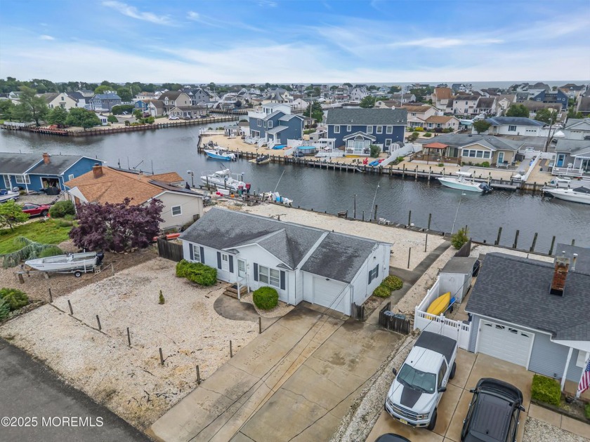 Opportunity knocks! This 2 bedroom, 1 bath waterfront home is - Beach Home for sale in Forked River, New Jersey on Beachhouse.com