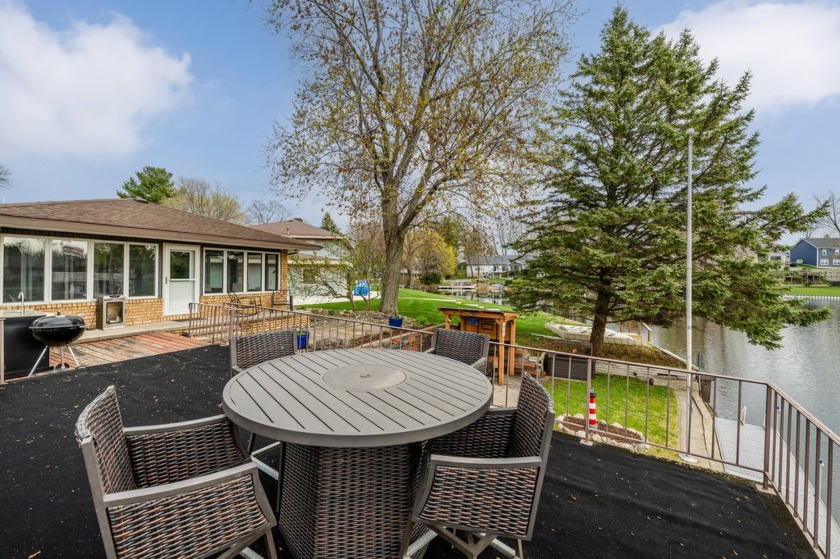 Look! Paw Paw Lake. Beautifully updated waterfront property - Beach Home for sale in Coloma, Michigan on Beachhouse.com