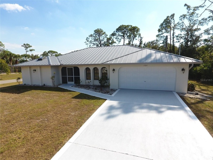 Discover Florida living at its best in this spacious 3-bedroom - Beach Home for sale in Port Charlotte, Florida on Beachhouse.com