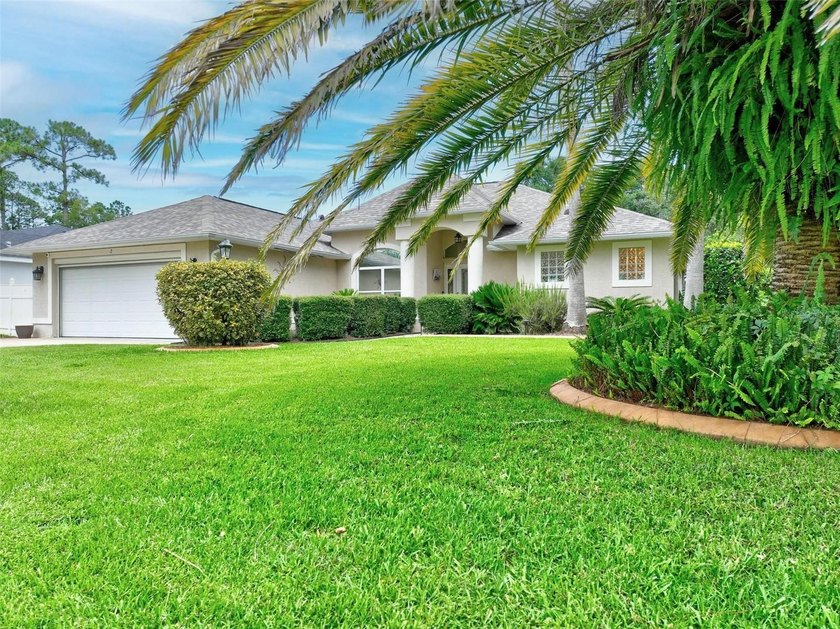 Welcome to this beautifully maintained pool home featuring 3 - Beach Home for sale in Palm Coast, Florida on Beachhouse.com
