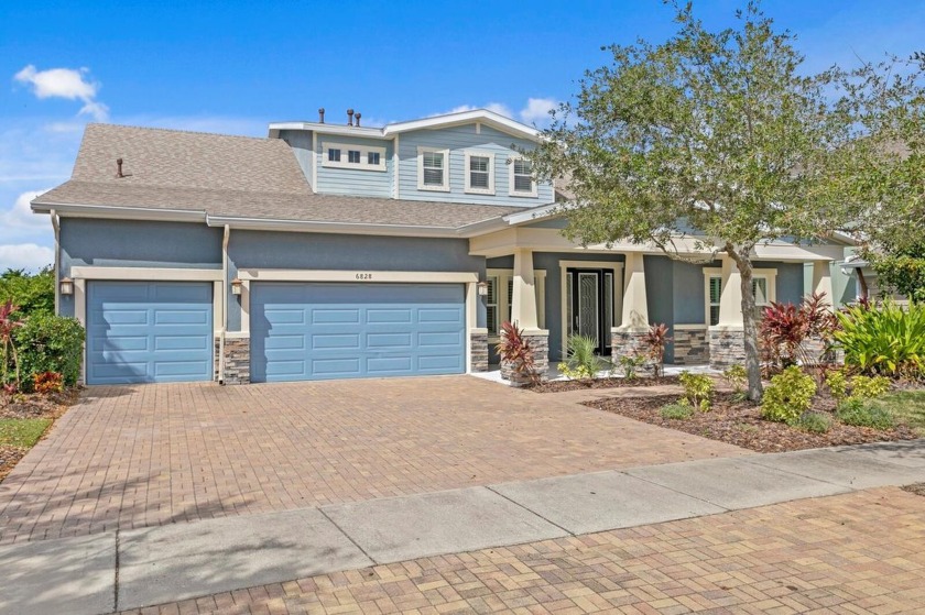 Get ready to fall in love with this former Homes by WestBay - Beach Home for sale in Apollo Beach, Florida on Beachhouse.com