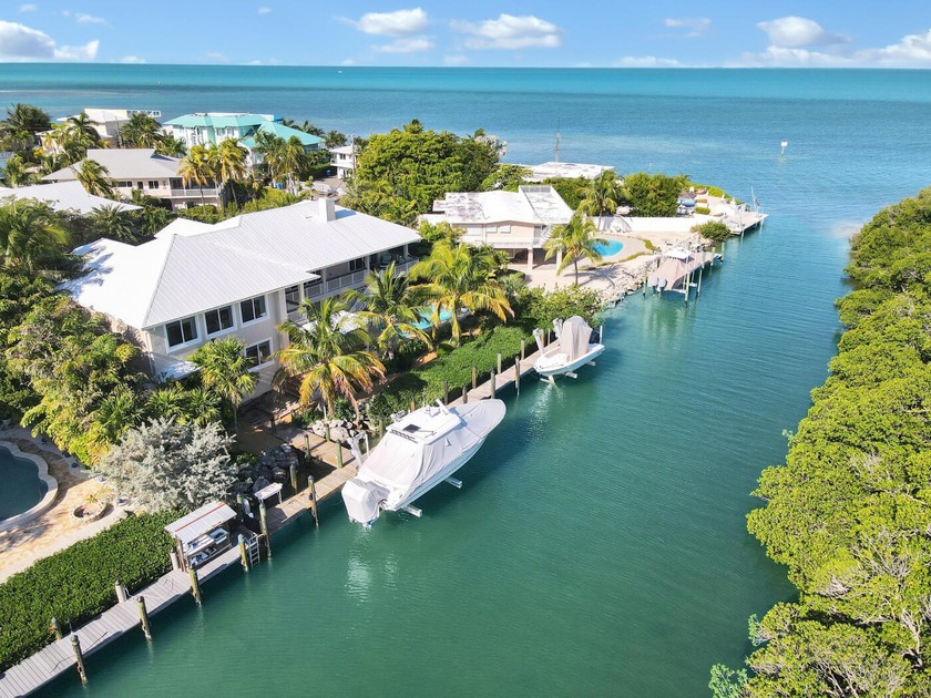 Experience modern coastal luxury in Islamorada, where elevated - Beach Home for sale in Lower Matecumbe Key, Florida on Beachhouse.com