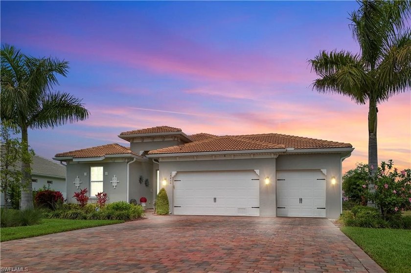 IMPACT WINDOWS - AIR CONDITIONED 3-CAR GARAGE - EXPANDED LANAI - Beach Home for sale in Naples, Florida on Beachhouse.com