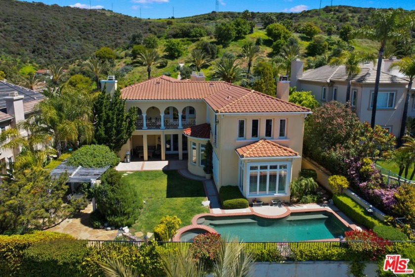 This exquisite home is located in the exclusive, guard-gated - Beach Home for sale in Pacific Palisades, California on Beachhouse.com