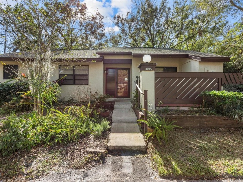 Discover your perfect home in this serene end-unit villa - Beach Condo for sale in Palm Harbor, Florida on Beachhouse.com