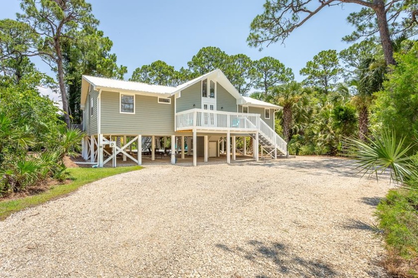 Charming canal-front home with a private dock in the exclusive - Beach Home for sale in St. George Island, Florida on Beachhouse.com