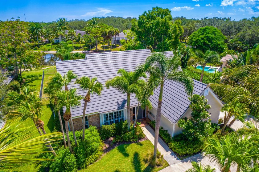 Nestled in the picturesque, tree-lined community of River Ridge - Beach Home for sale in Tequesta, Florida on Beachhouse.com