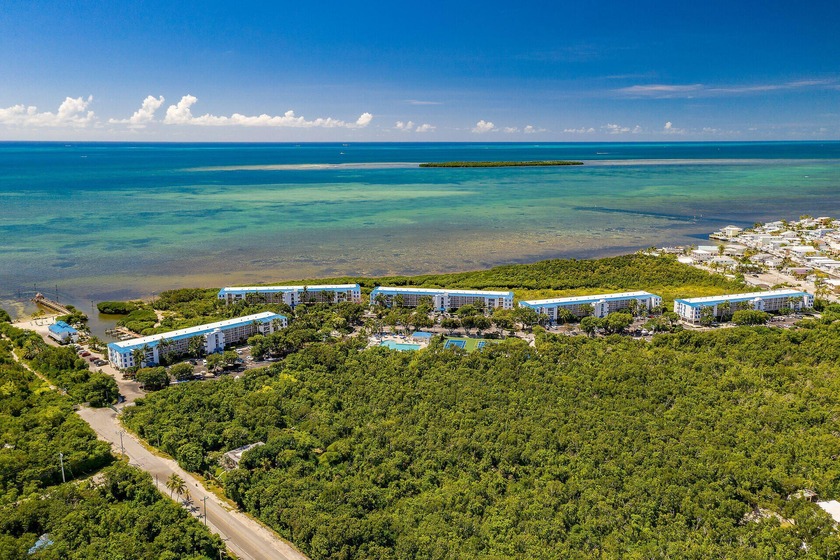 A coastal lifestyle awaits at Ocean Pointe Suites. Situated - Beach Condo for sale in Key Largo, Florida on Beachhouse.com