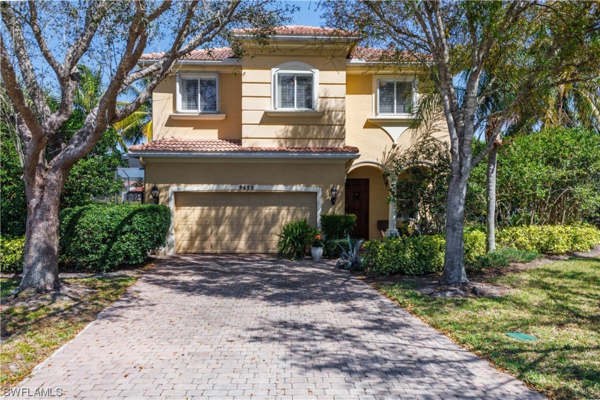 Step into luxury with this exquisite 4 bedroom, 3 1/2 bath pool - Beach Home for sale in Estero, Florida on Beachhouse.com