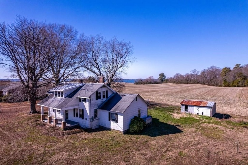 This 4-bedroom, 2-bath Cape Cod sits on 13.82 +/- acres in the - Beach Home for sale in Lancaster, Virginia on Beachhouse.com