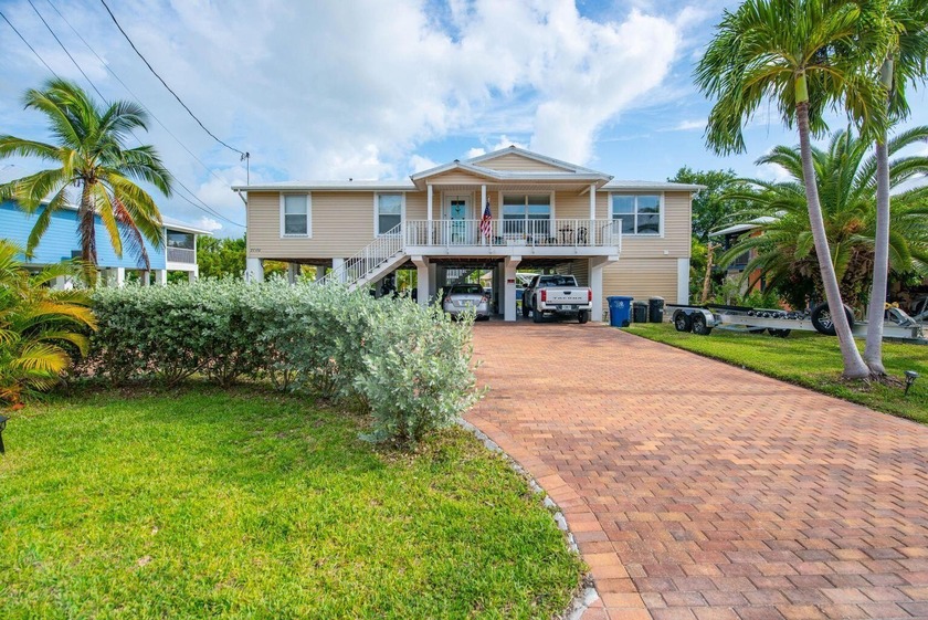 Nestled in Breezeswept Beach Estates, this fully remodeled - Beach Home for sale in Ramrod Key, Florida on Beachhouse.com