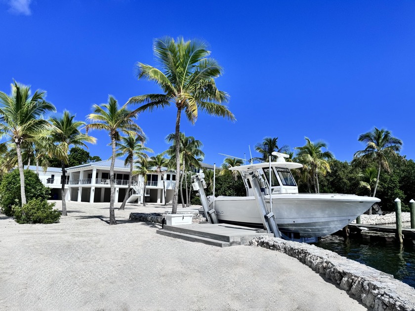 San Roc is a stunning, gated oceanfront estate set on 2.34 lush - Beach Home for sale in Plantation Key, Florida on Beachhouse.com