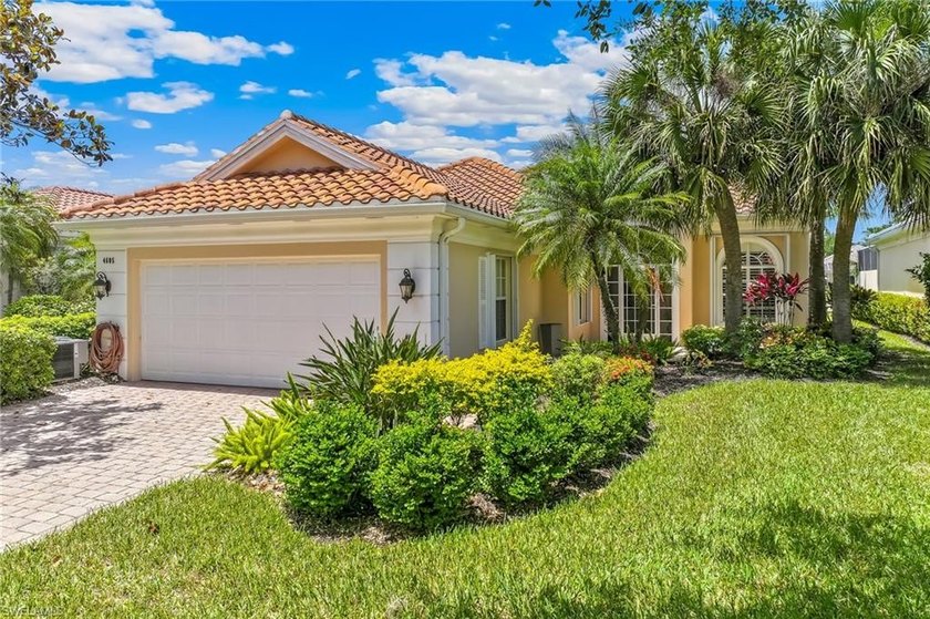 Lake View! Discover this beautifully maintained 3-bedroom plus - Beach Home for sale in Naples, Florida on Beachhouse.com