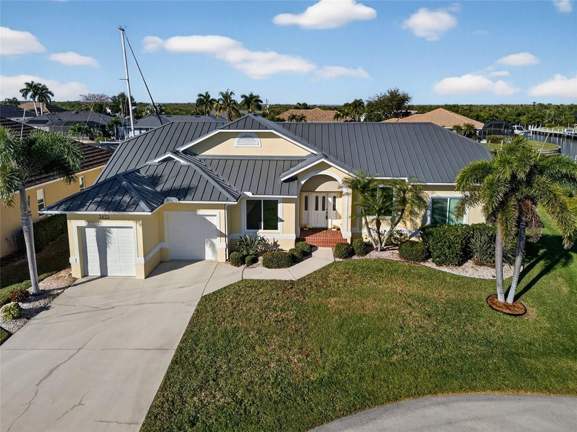BEST BOAT CANAL VIEWS IN PUNTA GORDA ISLES! FULLY FURNISHED - Beach Home for sale in Punta Gorda, Florida on Beachhouse.com