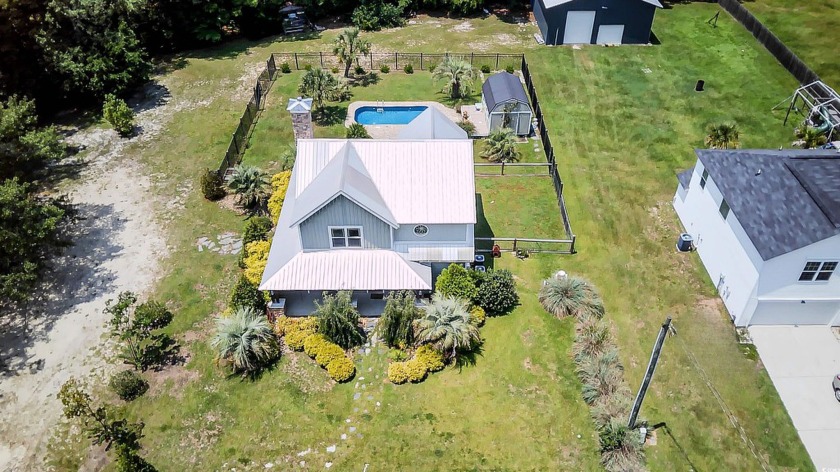 Welcome to 586 Loop Cir, a stunning 3-bedroom, 2-bathroom home - Beach Home for sale in Longs, South Carolina on Beachhouse.com