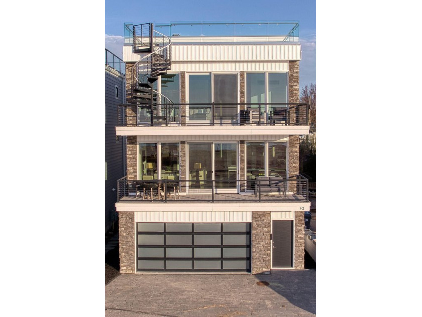 Step into the pinnacle of lake living with this extraordinary - Beach Home for sale in South Haven, Michigan on Beachhouse.com