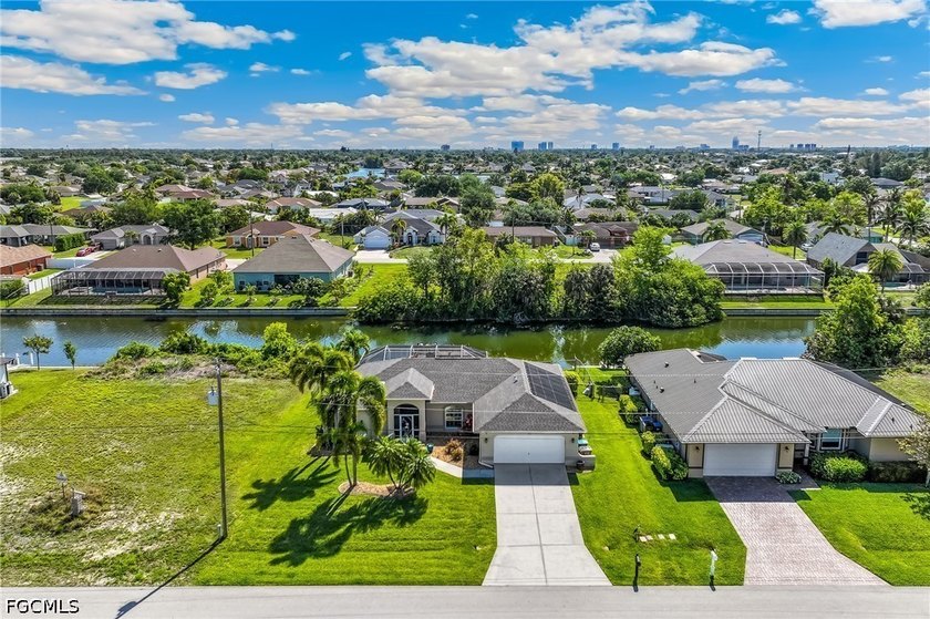 ASSESSMENTS PAID!! TURNKEY FURNISHED HOME WITH A BEAUTIFUL - Beach Home for sale in Cape Coral, Florida on Beachhouse.com