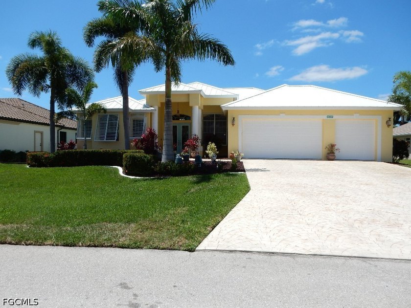 Beautiful 3 Bedroom 3 Bath 3 car garage with pool located in - Beach Home for sale in Cape Coral, Florida on Beachhouse.com