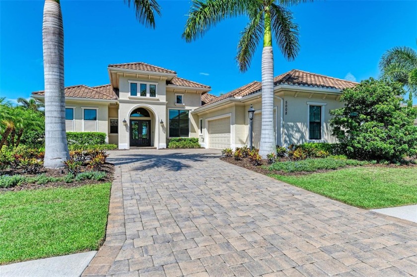 Welcome to your dream home! This rarely available Chandler II - Beach Home for sale in Lakewood Ranch, Florida on Beachhouse.com