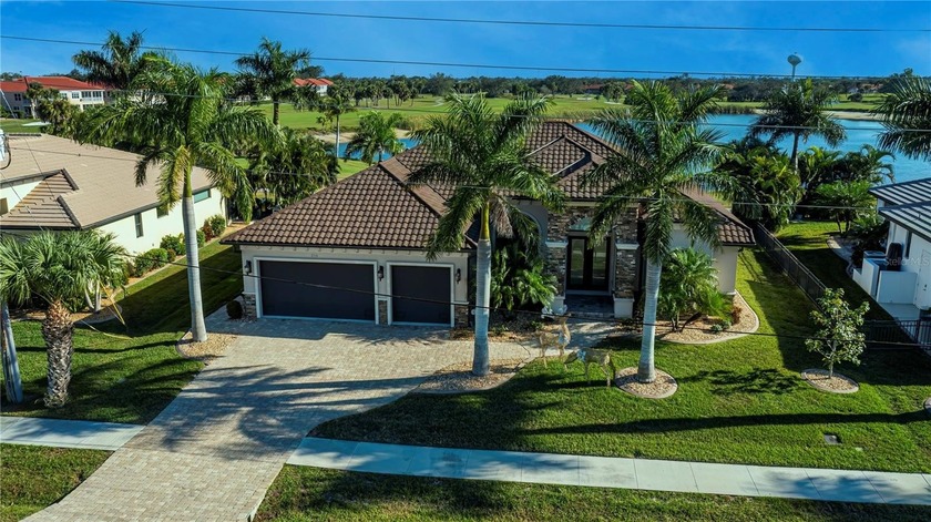 EXPERIENCE THE PINNACLE OF LUXURY LIVING  in this captivating & - Beach Home for sale in Punta Gorda, Florida on Beachhouse.com