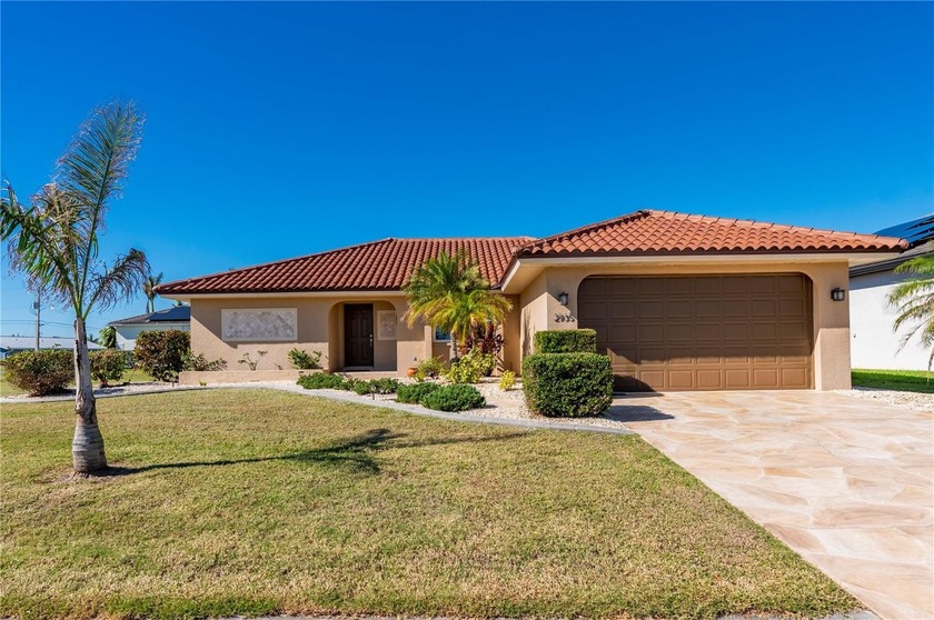 This beautifully updated 3-bedroom, 2-bath, 2-car garage home in - Beach Home for sale in Punta Gorda, Florida on Beachhouse.com