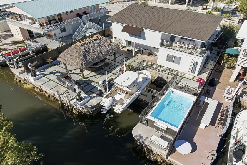 Your Waterfront Oasis Awaits You. Offering direct ocean access - Beach Home for sale in Key Largo, Florida on Beachhouse.com