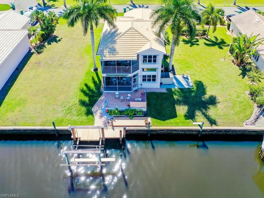 Discover waterfront living at its finest in Eveningstar Cay - Beach Home for sale in Naples, Florida on Beachhouse.com