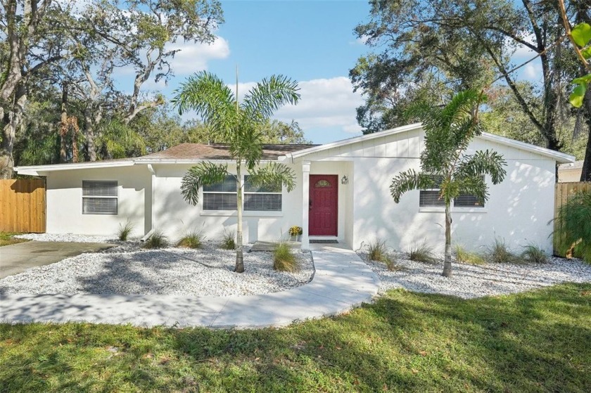 Don't miss this lovely SAFETY HARBOR ranch home tucked away in - Beach Home for sale in Safety Harbor, Florida on Beachhouse.com