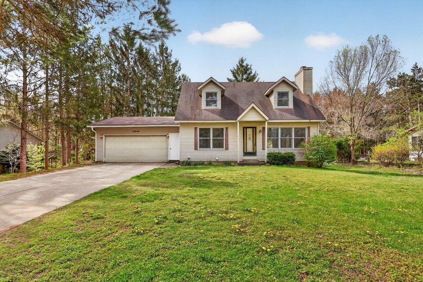 Welcome to this well-loved, one-owner home built in 1989 - Beach Home for sale in Holland, Michigan on Beachhouse.com