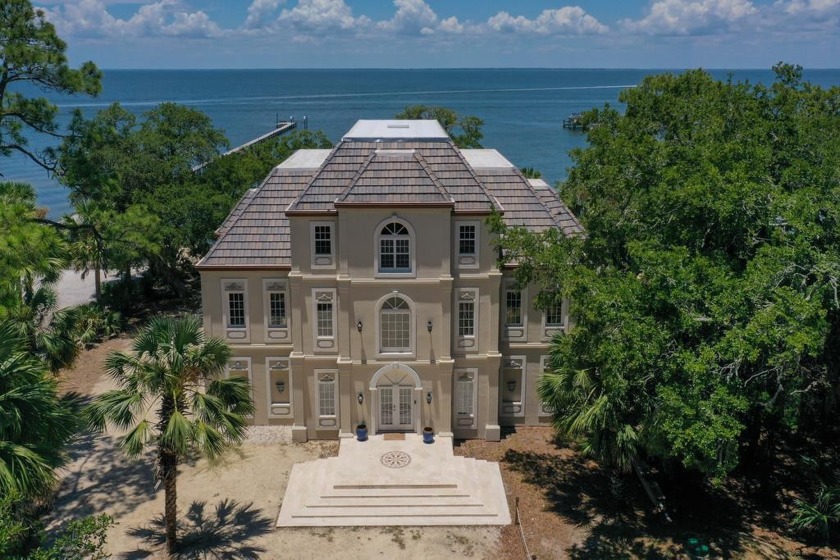 Maison Rose* Exquisite Bayfront French Chateau nestled in the - Beach Home for sale in St. George Island, Florida on Beachhouse.com