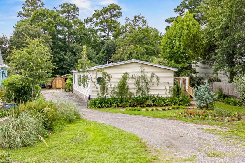 This hidden gem is located in the much sought after South - Beach Home for sale in Pawleys Island, South Carolina on Beachhouse.com