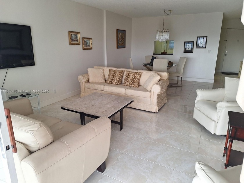 Enjoy beautiful view of the pool and lake/Fountain from your - Beach Condo for sale in Dania, Florida on Beachhouse.com