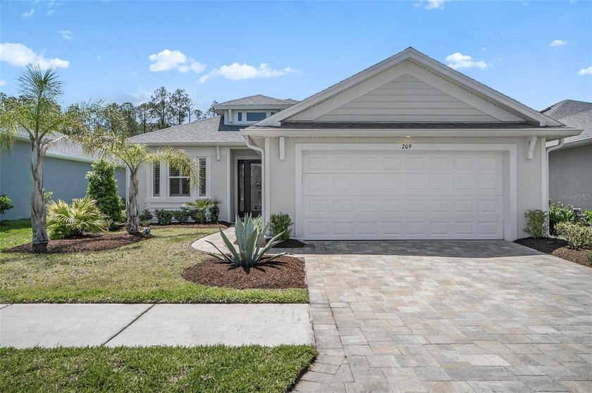 Welcome to this beautifully built 2024 home in the desirable - Beach Home for sale in Palm Coast, Florida on Beachhouse.com