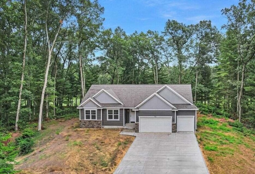 Discover your oasis in the picturesque Water Access community on - Beach Home for sale in Whitehall, Michigan on Beachhouse.com