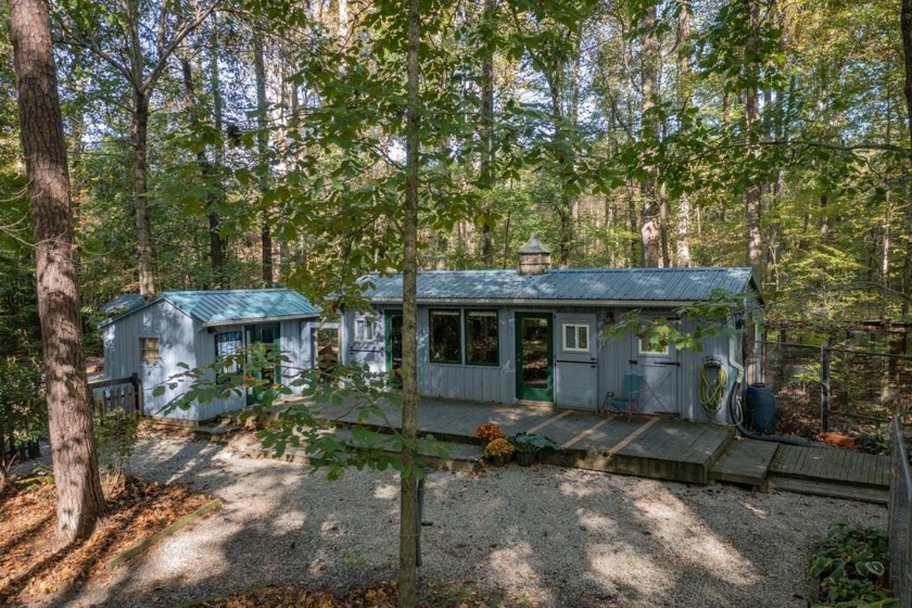 Tucked in the woods, this private oasis feels worlds away from - Beach Home for sale in Weems, Virginia on Beachhouse.com