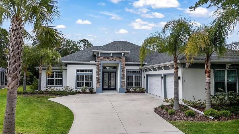 Welcome to this stunning 2023 custom-built smart home, offering - Beach Home for sale in Palm Coast, Florida on Beachhouse.com